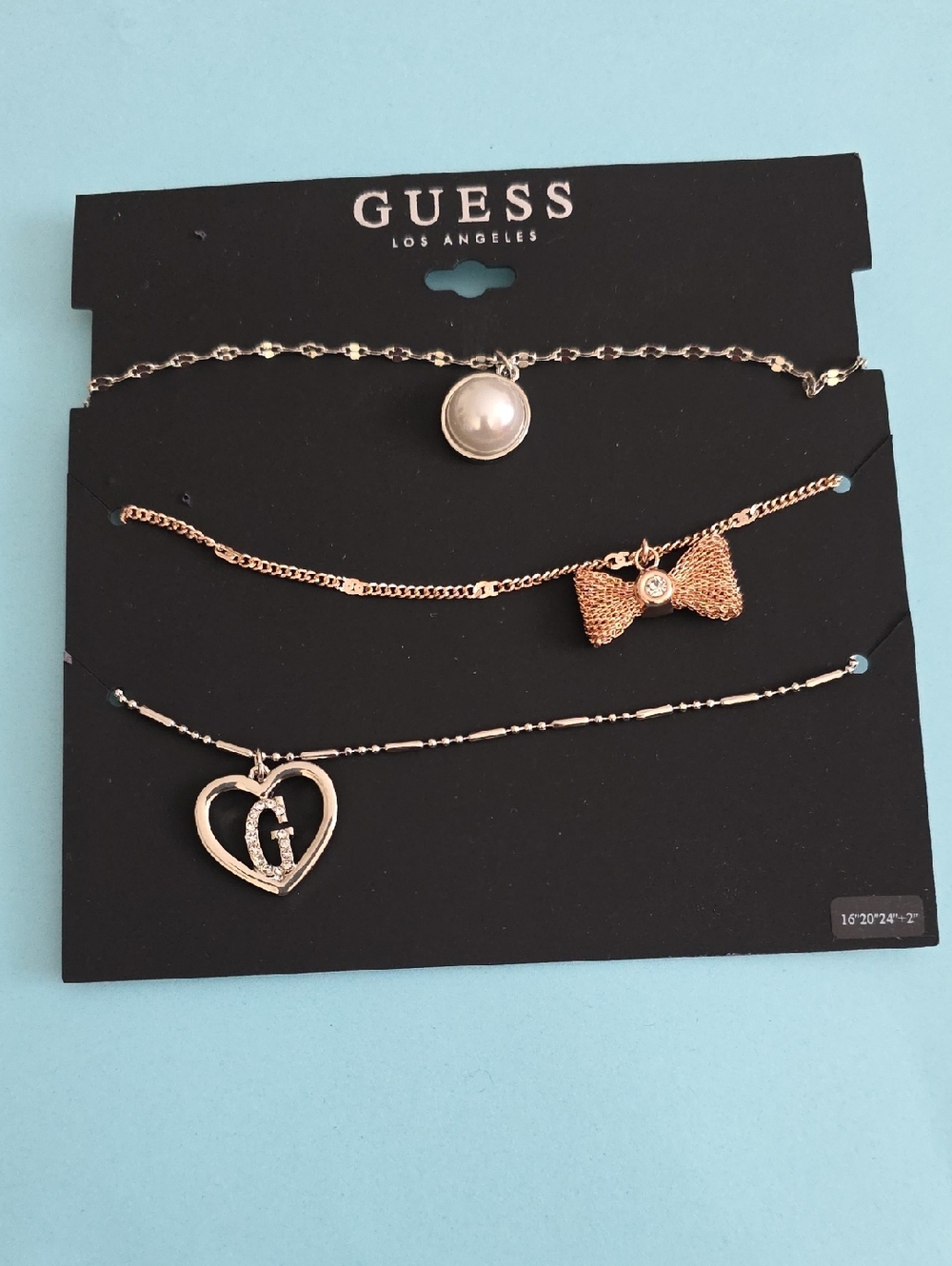 GUESS Rose Gold & Silver Layered Necklace Set with Pearl, Bow & Heart